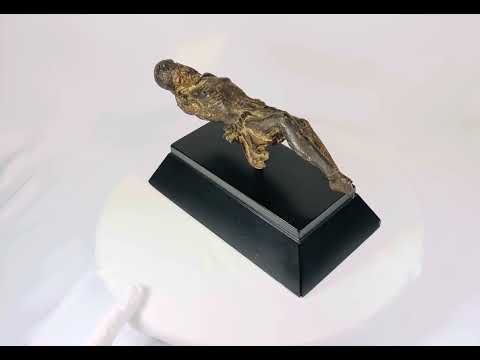 Video of a 17th-century European wooden crucifix figure of Christ, hand-carved in the Baroque style and displayed on a black museum stand — Relic & Rarity.
