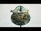 360° view of an ancient Roman bronze pendant with engraved soldier figures, 1st–4th century CE.