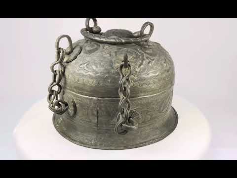 Indo-Persian cast metal censer with Mughal floral engraving shown in video, highlighting domed lid, chain attachments, and aged patina