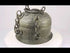 Indo-Persian cast metal censer with Mughal floral engraving shown in video, highlighting domed lid, chain attachments, and aged patina