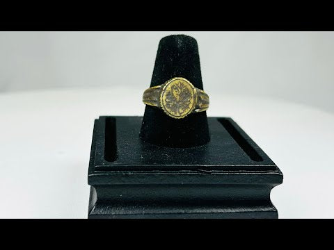 Late Roman to Early Byzantine gold-gilded bronze ring, circa 300–600 CE, with engraved floral bezel, worn gilding, and authentic patina.