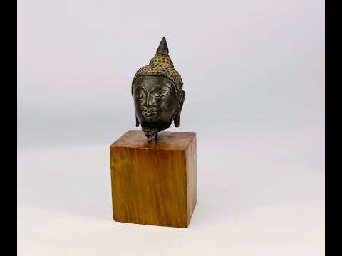 360 video of 17th–18th century Asian bronze Buddha head from Thailand with serene expression and natural patina