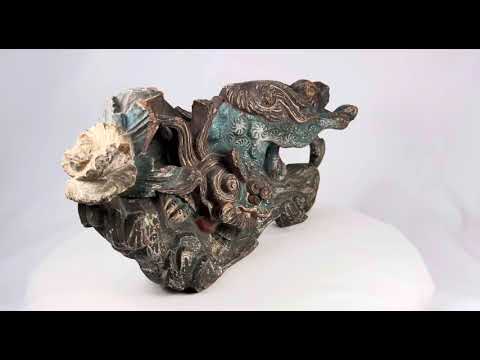 Hand-carved wooden Qilin temple carving from Qing Dynasty China, circa 18th–19th century. Mythical guardian beast with flowing mane, painted details in turquoise, red, and gold, symbolizing prosperity, protection, and divine presence.