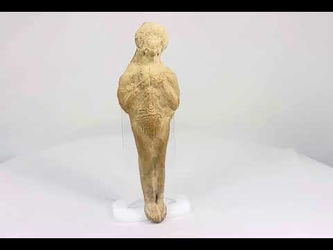 Roman terracotta fertility figure, 1st–3rd century CE, with raised arms, incised detailing, and aged earthen patina.