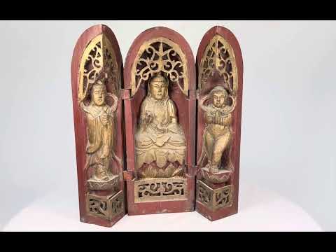 Qing Dynasty portable Buddhist shrine, circa 18th–19th century, hand-carved and painted wood triptych with gilded figures and intricate lattice details.
