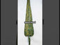 Video describing a bronze Age leaf-form spearhead (2500–1900 BCE) with aged green patina rotating on display — early weapon technology from the ancient Near East.