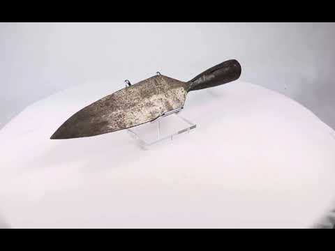 18th-century Indo-Persian forged iron spearhead with broad leaf-shaped blade, tapered socket, and aged patina.