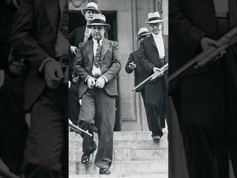 Historical video showcasing George “Machine Gun Kelly” Barnes and his legacy, featuring archival photographs, rare autograph display, and details about his infamous 1930s gangster era—RelicAndRarity.com.