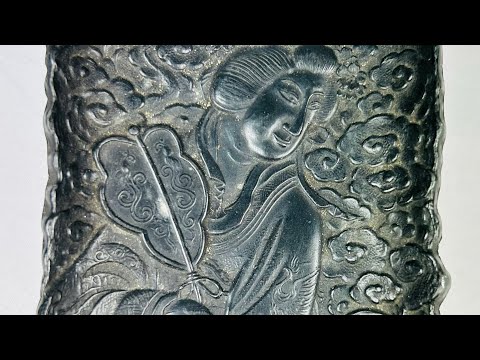 Antique Qing Dynasty cast metal scholar’s tray intricately decorated with figures of Daoist immortals among swirling cloud motifs, featuring detailed robes, flowing hair, and symbolic patterns; used as a scholar’s desk accessory for brushes or offerings, with dark aged patina highlighting fine craftsmanship from 18th–19th century China.