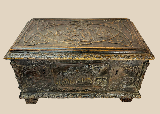 Renaissance Italian cassone chest with hand-carved figural and foliate panels, circa 16th–17th century