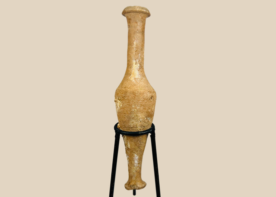 Ancient Roman terracotta unguentarium perfume vessel with elongated spindle body and flared rim