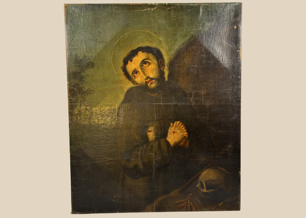 Spanish Colonial oil painting of Saint Francis with skull and halo