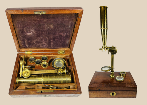 Victorian brass simple microscope with mahogany case and interchangeable lenses