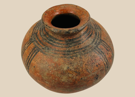 West African terracotta pottery vessel with black painted geometric decoration