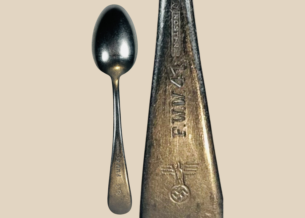 Authentic WWII German Kriegsmarine stainless steel spoon with visible wartime markings and patina